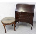 A reproduction mahogany bureau,