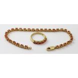 An 18ct gold 'Ceylon Padparadscha' sapphire bracelet and a matching 18ct 'Ceylon Padparadscha'