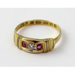 A 22ct diamond and pink sapphire three-stone ring, size N, approx 2.5g.