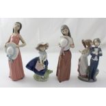 Four Lladró figures; two young ladies with large bonnets,