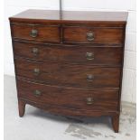 A Victorian mahogany bow-front two-over-three chest of drawers to curved plinth and splayed