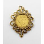 A Victorian half sovereign, 1856, in filigree yellow metal mount, approx 7.7g.