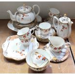 A Grafton China 'Arcadia' pattern part dinner and tea service including saucers, side plates,