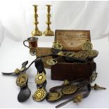 A vintage box 'Gaseous Fluid', containing a quantity of antique and vintage horse brasses,