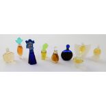 A collection of miniature perfume bottles to include a boxed set of five bottles from the 'Luxury