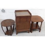 An oak side cabinet with two short drawers,