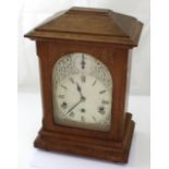 An early 20th century oak-cased eight-day quarter chime mantel clock by Kienzle,