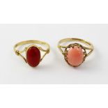 Two 9ct gold ladies' dress rings, each set with coral coloured stone, size L and N,