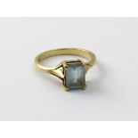 A 9ct gold ladies dress ring with emerald cut blue stone, size L, approx 2.3g.