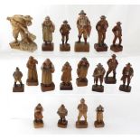 A quantity of Black Forest style carved hardwood figures.