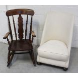 An early 20th century oak country-style rocking chair,