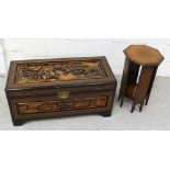 A 20th century Oriental carved camphor chest of small proportions decorated with flora and figures,
