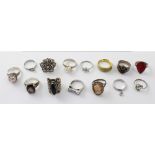 Fourteen various silver rings, some set with semi-precious stones,