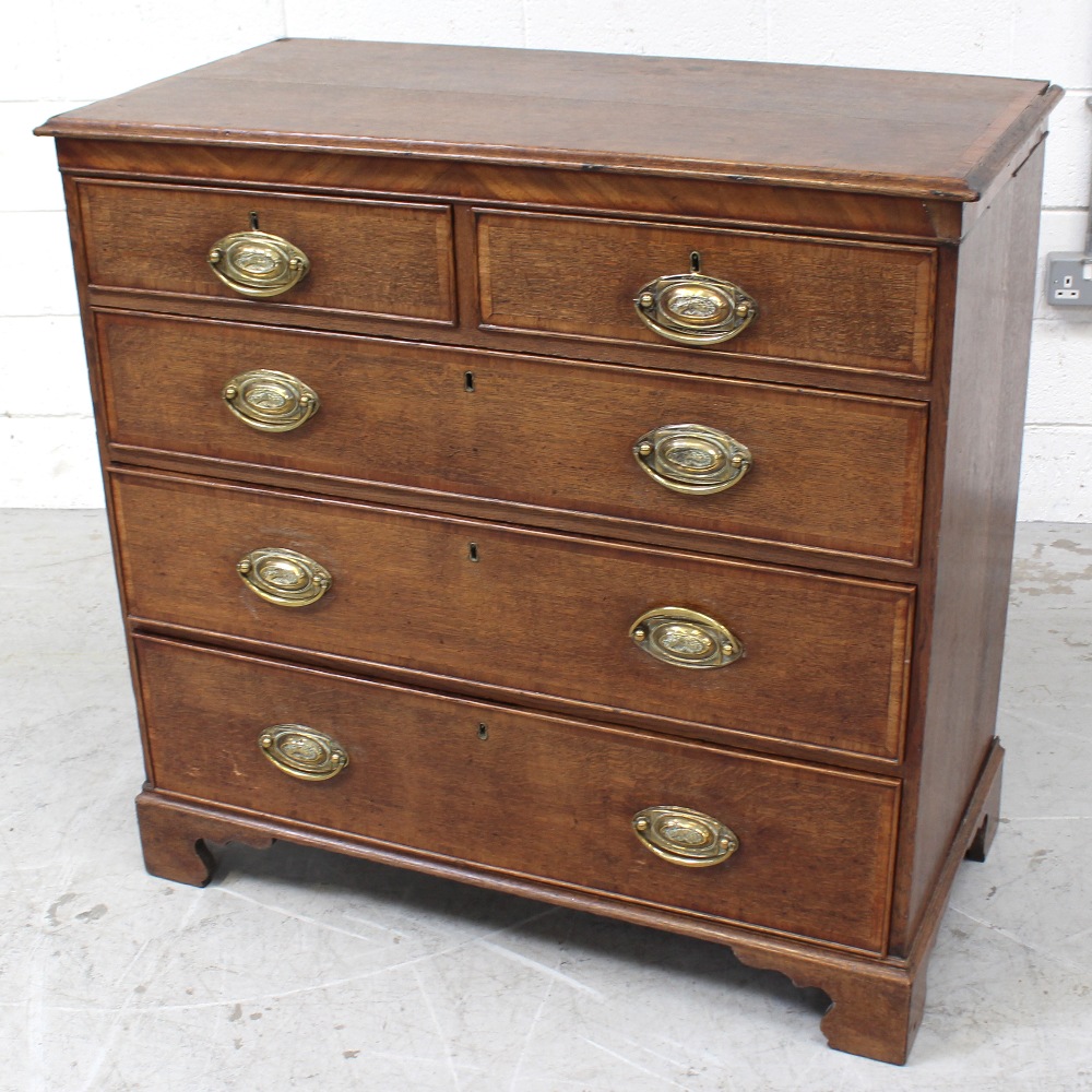 A 19th century oak two-over-three chest of drawers, on shaped plinth base, 98 x 103cm.