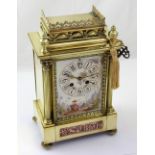 A 19th century French architectural brass mantel clock,