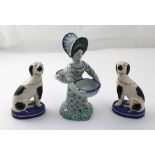 A pair of Staffordshire dogs on cobalt blue bases,