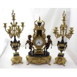 A Louis XVI style lyre-shaped clock and garniture, the clock in black marble,