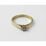 A 9ct gold ladies' ring set with small solitaire white stone, size O, approx 1.8g.