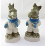 A pair of ceramic Jim Bean whisky decanters in the form of donkeys, marked to base,