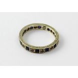 A 9ct white gold sapphire and diamond eternity ring, size O, approx 3g.