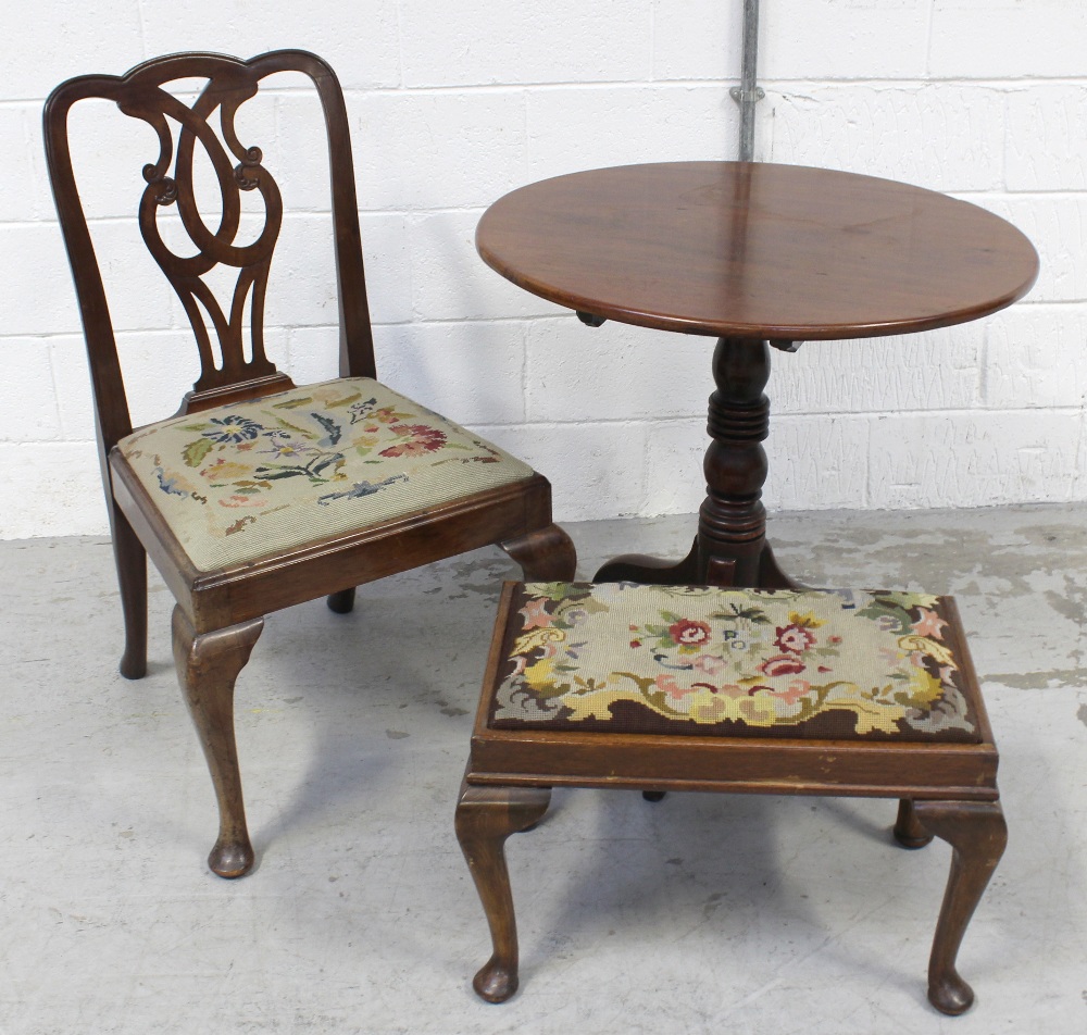 A late 19th/early 20th century mahogany circular side table on baluster column to tripartite