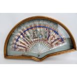 An early 19th century paper fan hand painted in watercolour, gouache and pencil,