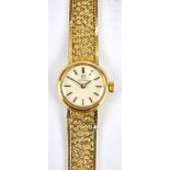 OMEGA; a 1970s 9ct yellow gold manual wind lady's cocktail wristwatch,