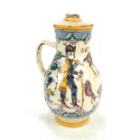 An unusual early 19th century Spanish tin glazed jar with central small raised aperture,