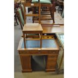 An early 20th century oak child's desk and chair (2).