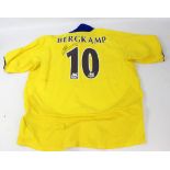 DENNIS BERGKAMP; a replica Arsenal 2003-04 away shirt, signed to back.