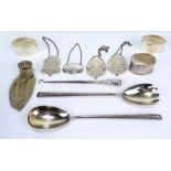 A small mixed lot of silver items comprising a boxed pair of napkin rings with engraved initials,