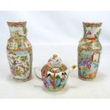 A pair of late 19th century Chinese Export Famille Rose vases with figural panels and wavy rims,