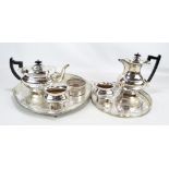 An electroplated four piece tea set, a bottle coaster and two trays (7).