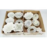 A collection of predominantly 19th century Shelley ceramic jelly moulds in various sizes and shapes,