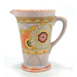 A Charlotte Rhead for Crown Ducal jug with gilt and floral decoration, height 16cm.