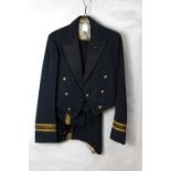 An RAF officer's dress/mess uniform comprising coatee with cloth badge to lapel with two broad and