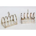 VINER'S LTD; a pair of George VI hallmarked silver lancet shaped four division toast racks,