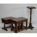 An oak nest of three tables, top 61 x 38cm, a dropleaf occasional table, and a stand (3).