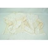 Two Edwardian silk blouses with elaborate lace trim, each length approx 64cm (2).