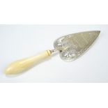 THOMAS WHITE; a Victorian hallmarked silver trowel with engraved decoration,