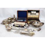 A small group of electroplated items including an oval galleried tray, a bread basket,
