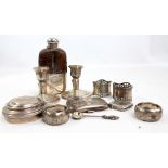 A group of hallmarked silver items comprising cigarette case, vesta, leather mounted hip flask,