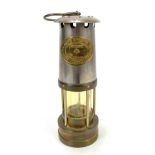 An early 20th century Thomas & Williams Ltd Cambrian safety lamp, no.113820, height 26.5cm.