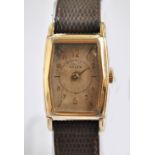 ROLEX; a gentleman's mechanical wristwatch in gold filled tonneau case,