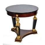 A reproduction French Empire style centre table with veined black marble top above plain frieze and