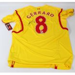 STEVEN GERRARD; a replica Liverpool FC no.8 away shirt, signed to back.