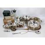 A group of electroplated items to include trays, bonbon dishes, entree dishes and a claret jug.