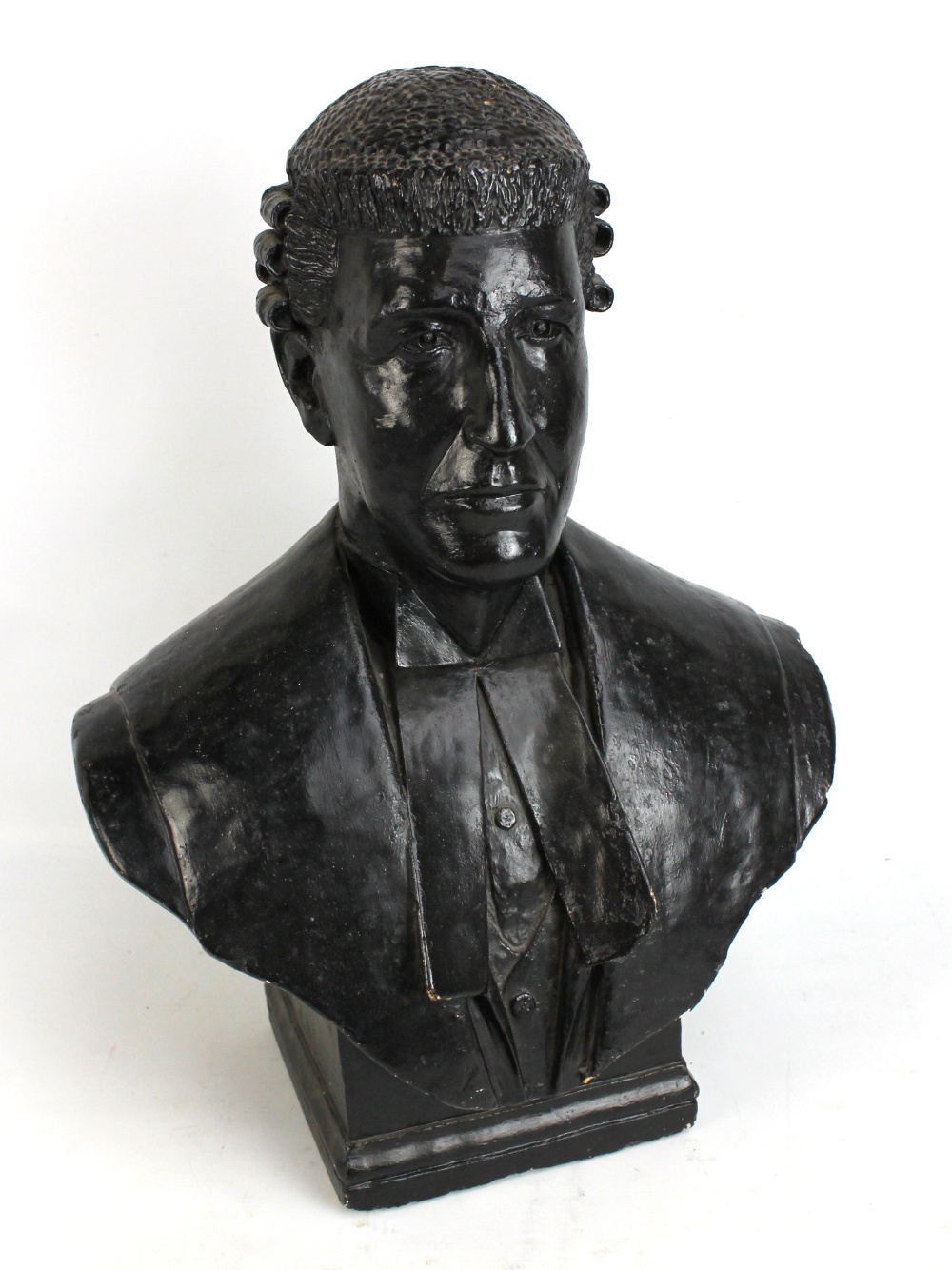 A plaster bust of a judge wearing wig and robes, approx 62 x 45cm.