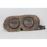 A pair of British WWI anti-gas goggles, width approx 20.5cm.