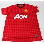 SIR ALEX FERGUSON; a signed Manchester United replica shirt, further inscribed 'Best Wishes'.